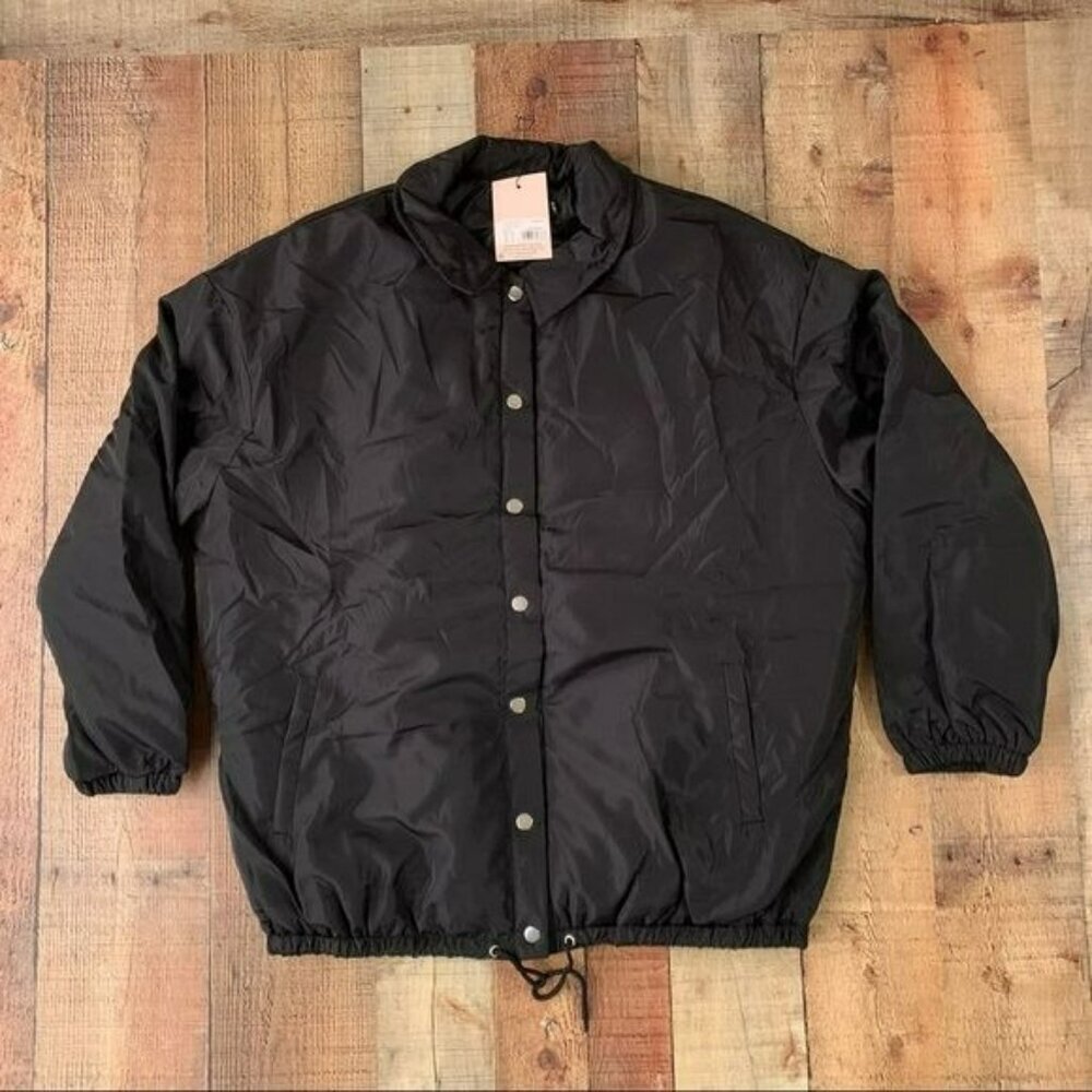 Missguided women’s size 12 nylon coach medium length jacket in black